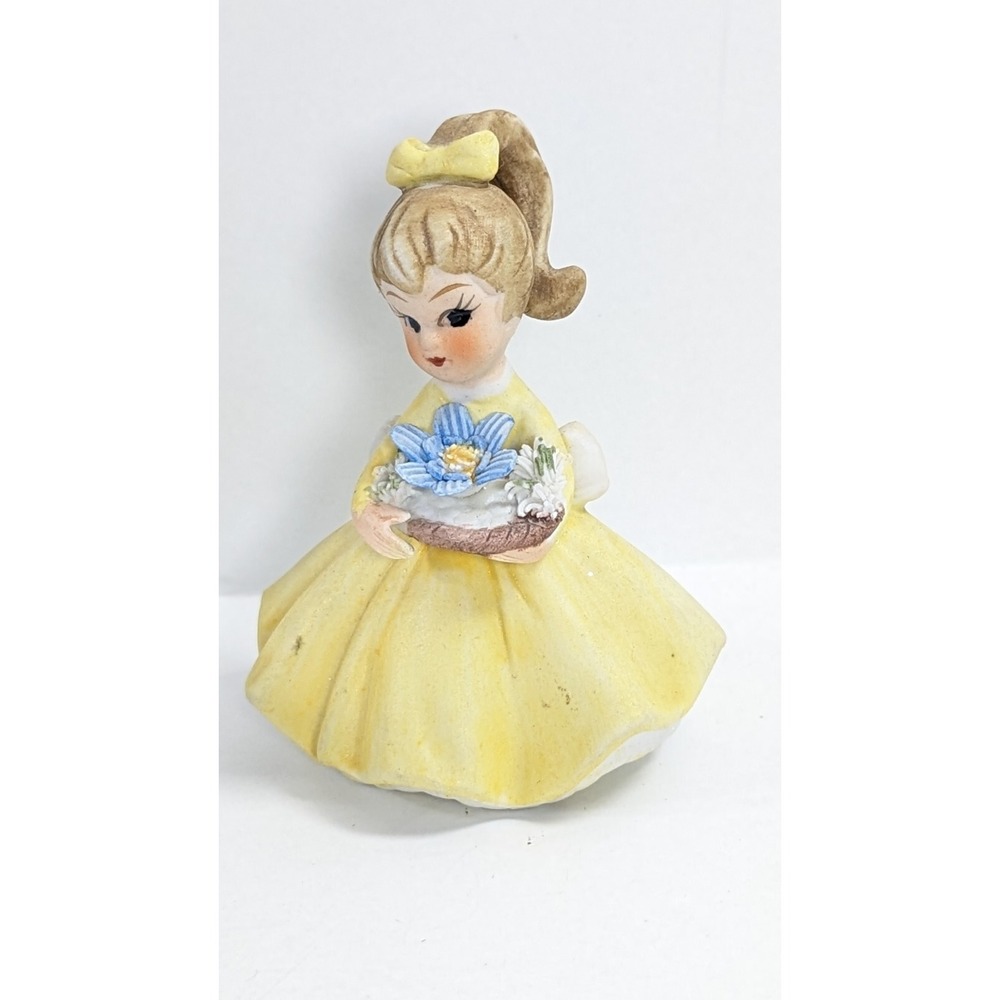 Vintage Napco blue Flower Girl Figurine with yellow dress